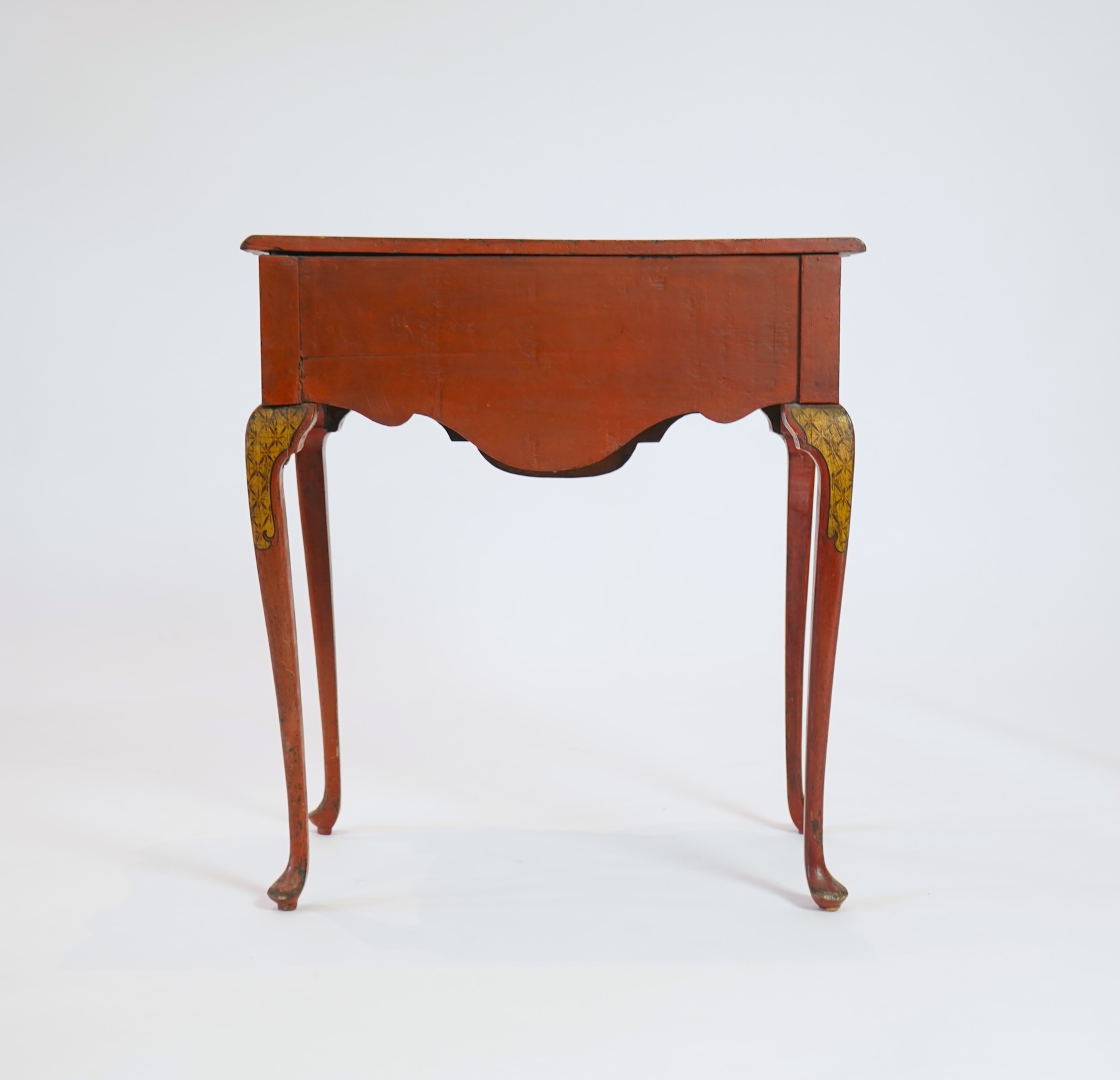 An early 18th century scarlet japanned lowboy